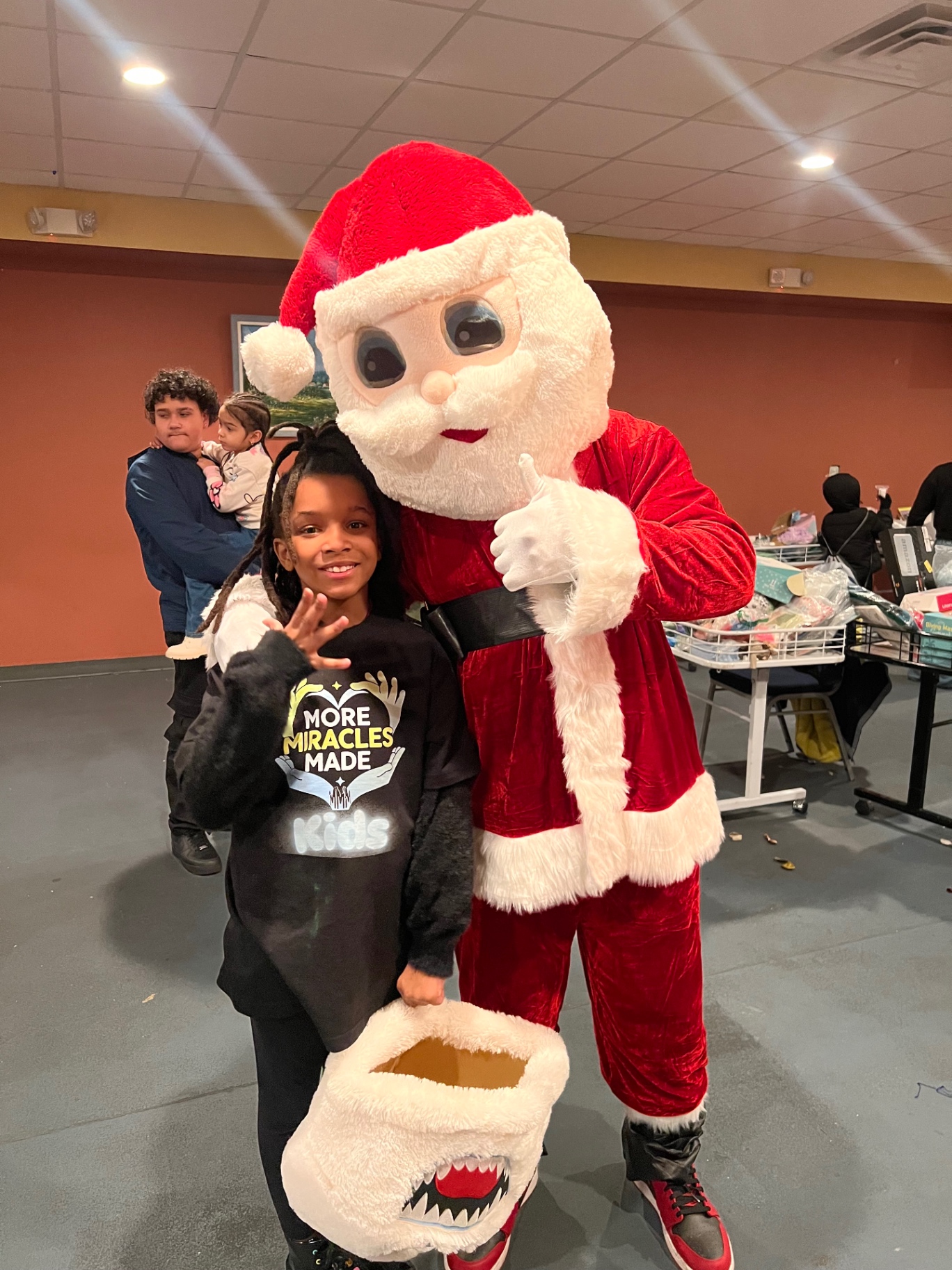Smiles all around at the toy giveaway