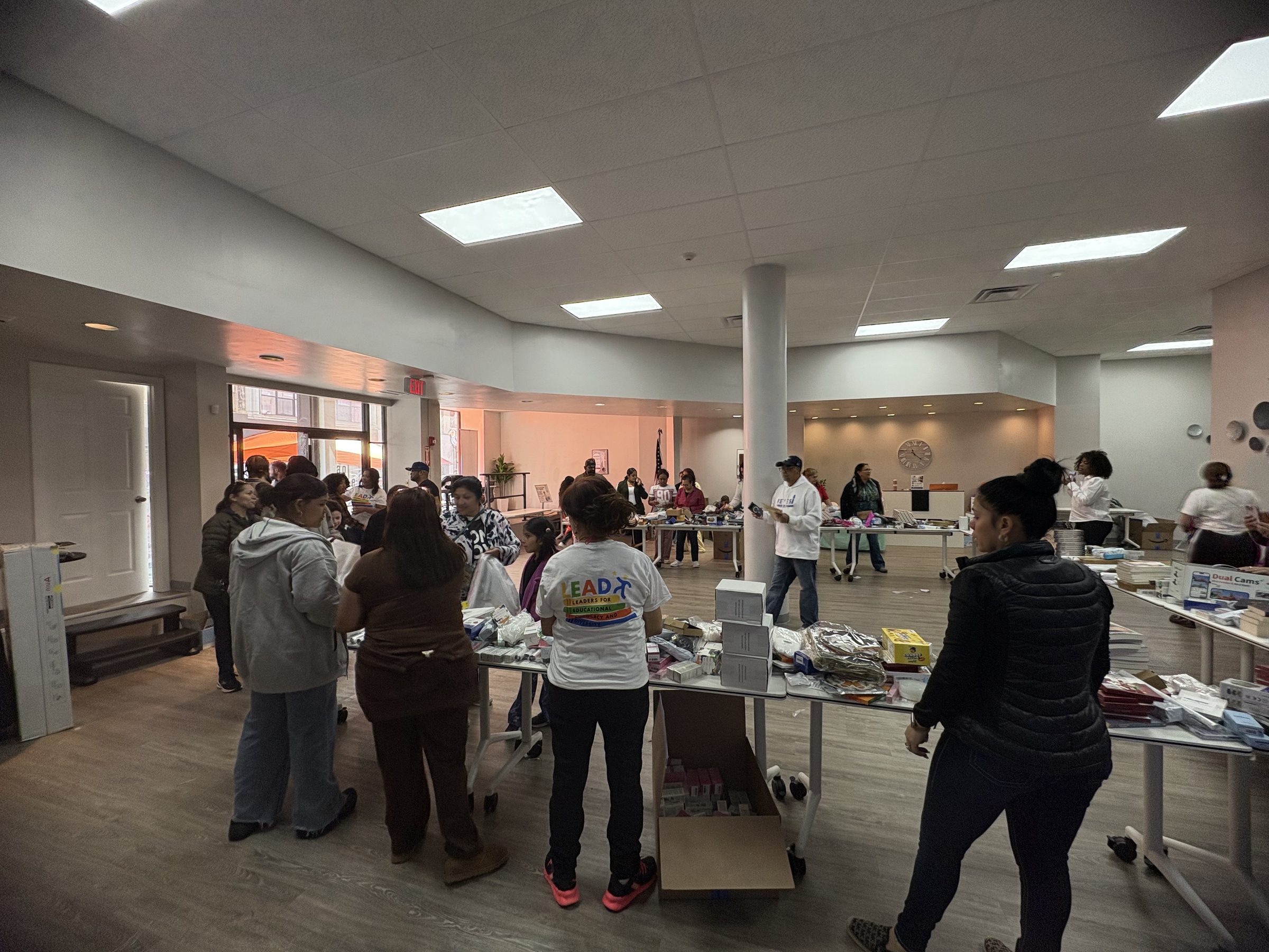 Neighbors and volunteers filling the tables