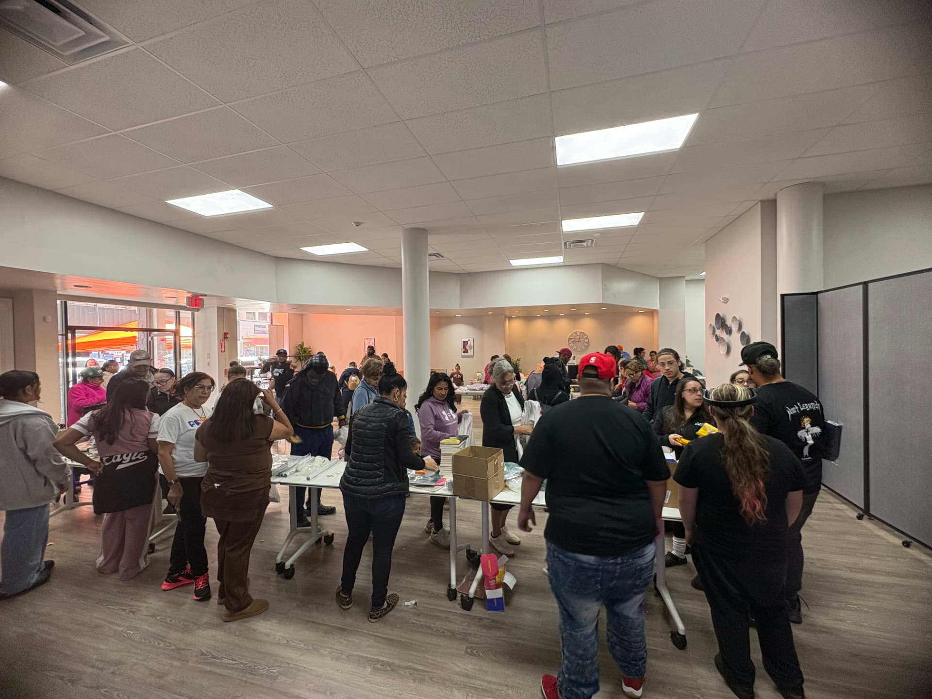 Volunteers sorting supplies in the giveaway hall